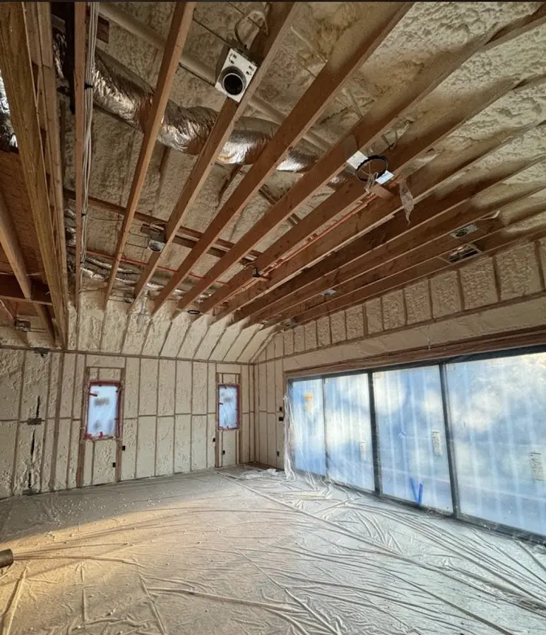 Interior walls and ceiling insulated with spray foam during new construction in South Strabane